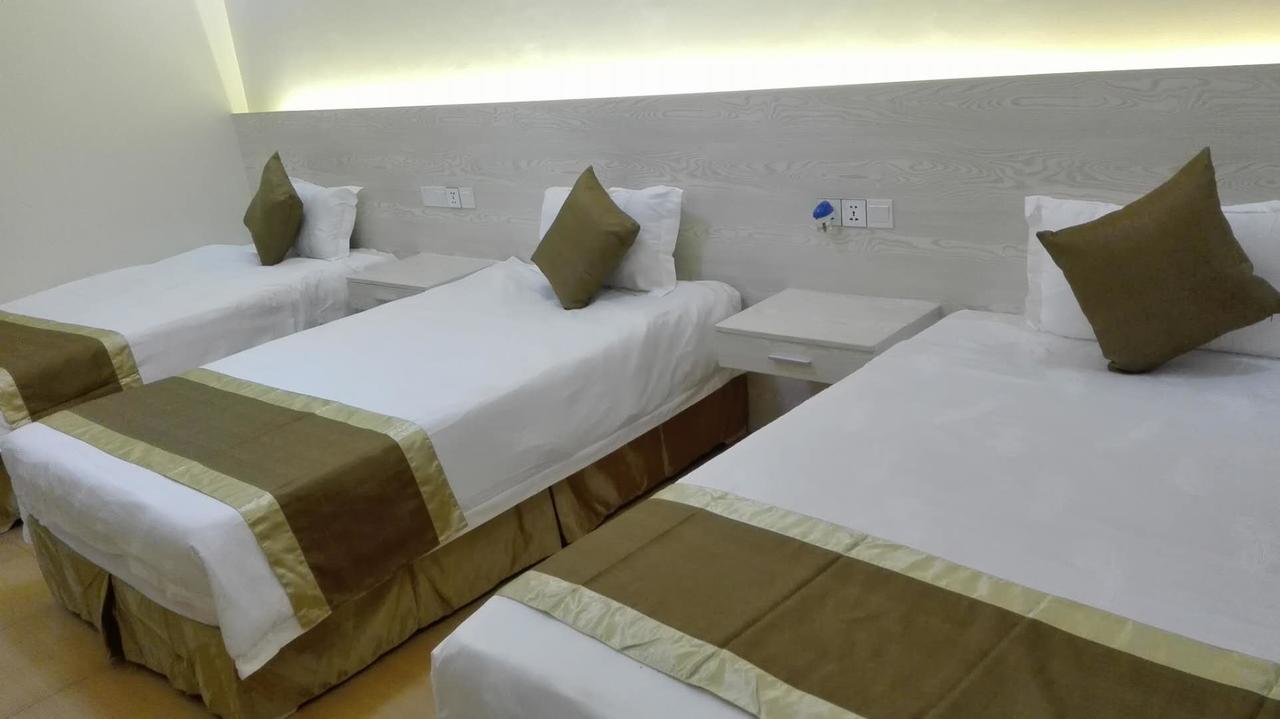 Nanjing Restaurant & Motel Kampala Szoba fotó