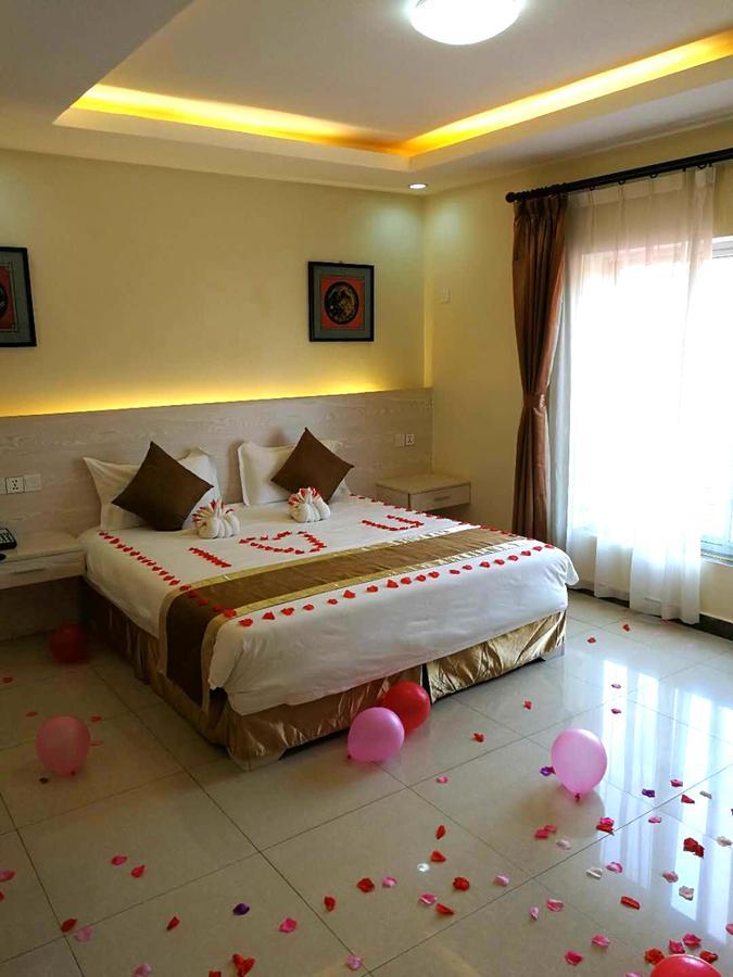 Nanjing Restaurant & Motel Kampala Szoba fotó
